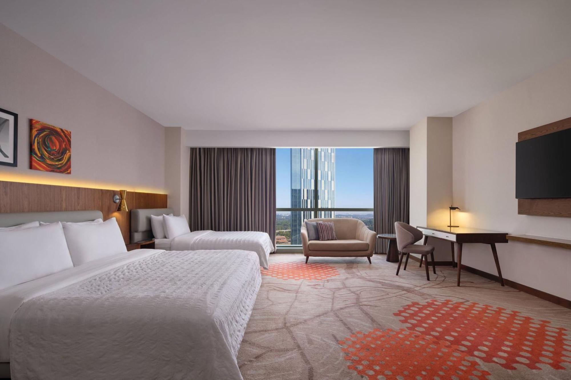 فندق لو ميريديان بوتراجايا المظهر الخارجي الصورة A guest room at the hotel